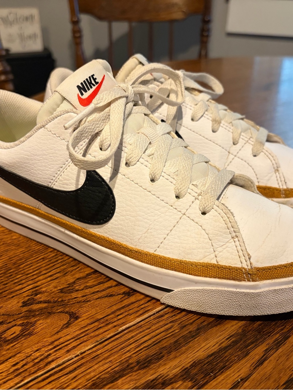 Nike White Sneakers with Black Swoosh and Tan Trim